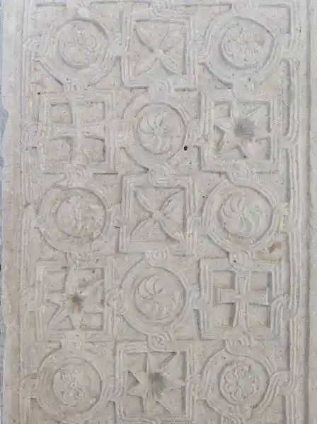 Parapet, balustrade, repeating religious patterns, crosses, swirls, floral and rosette design, located in Bode Museum